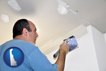 a contractor spackling drywall - with Delaware icon