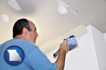 a contractor spackling drywall - with Missouri icon
