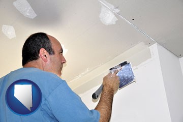 a contractor spackling drywall - with Nevada icon