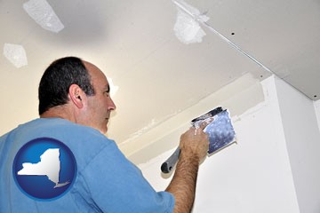 a contractor spackling drywall - with New York icon