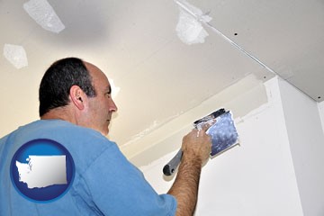 a contractor spackling drywall - with Washington icon