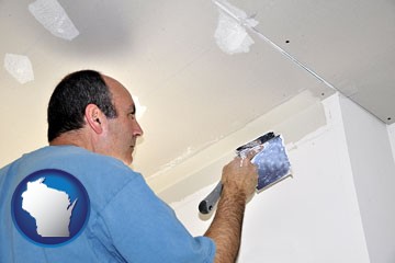 a contractor spackling drywall - with Wisconsin icon